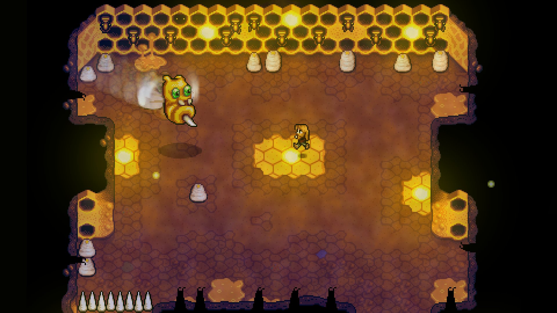 Haunted Chocolatier protagonist in giant beehive boss arena squaring off against a hostile but very cute giant bee.