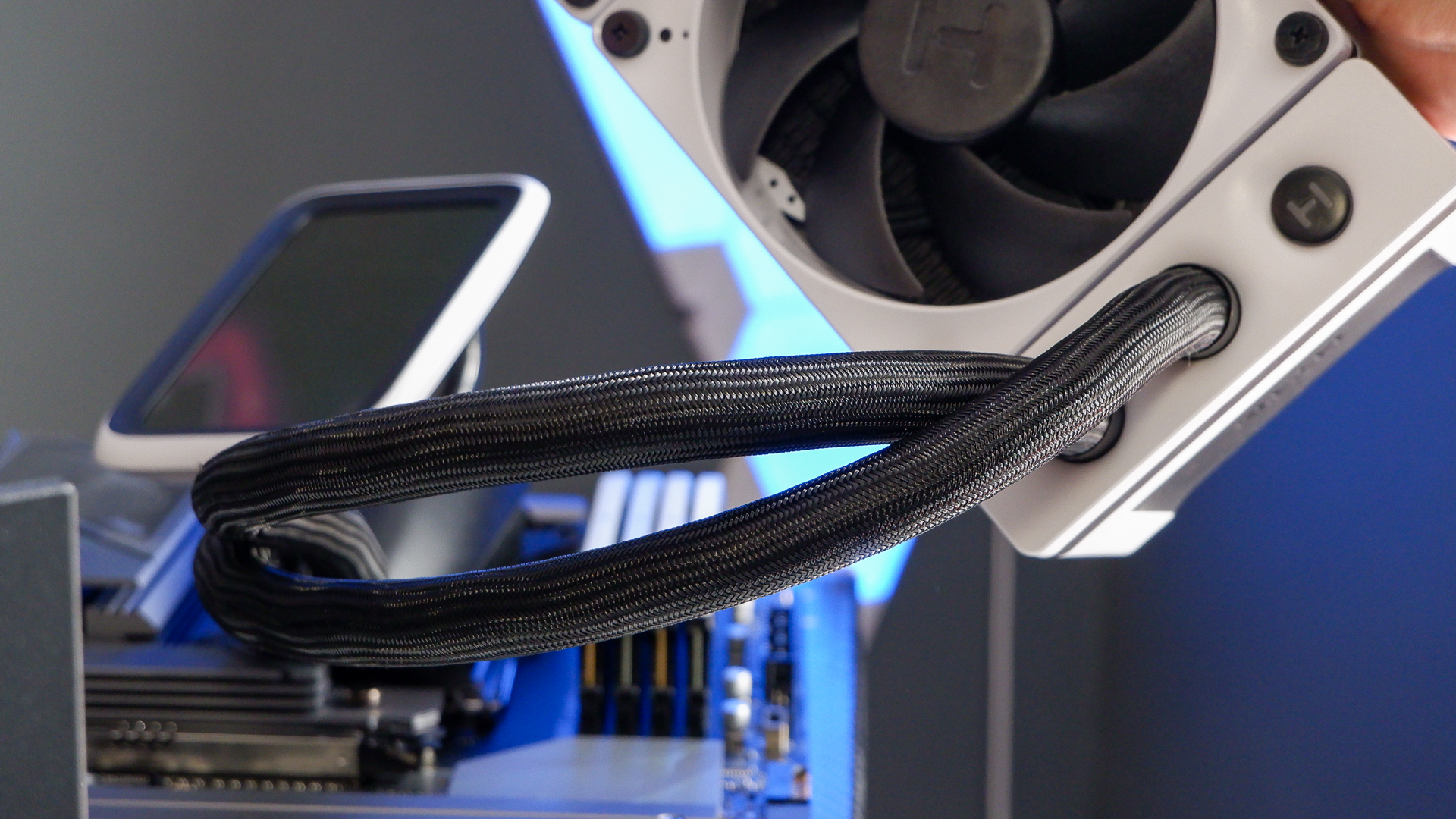 Parts of the PC build process that I have a particular gripe with, such as USB connectors, short cables and tubes, and SSD slots.