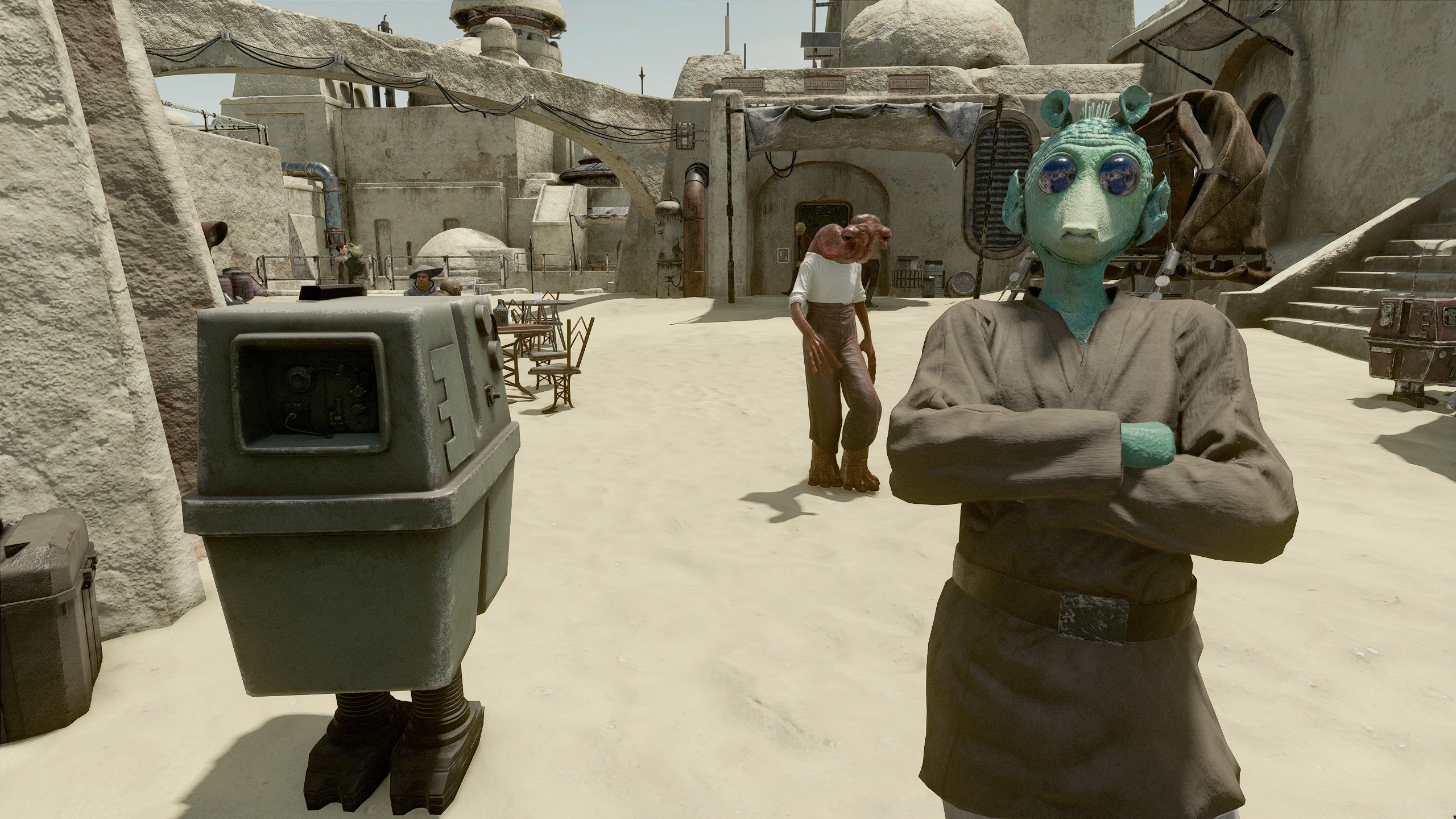 A gonk droid and greedo alien from Star Wars