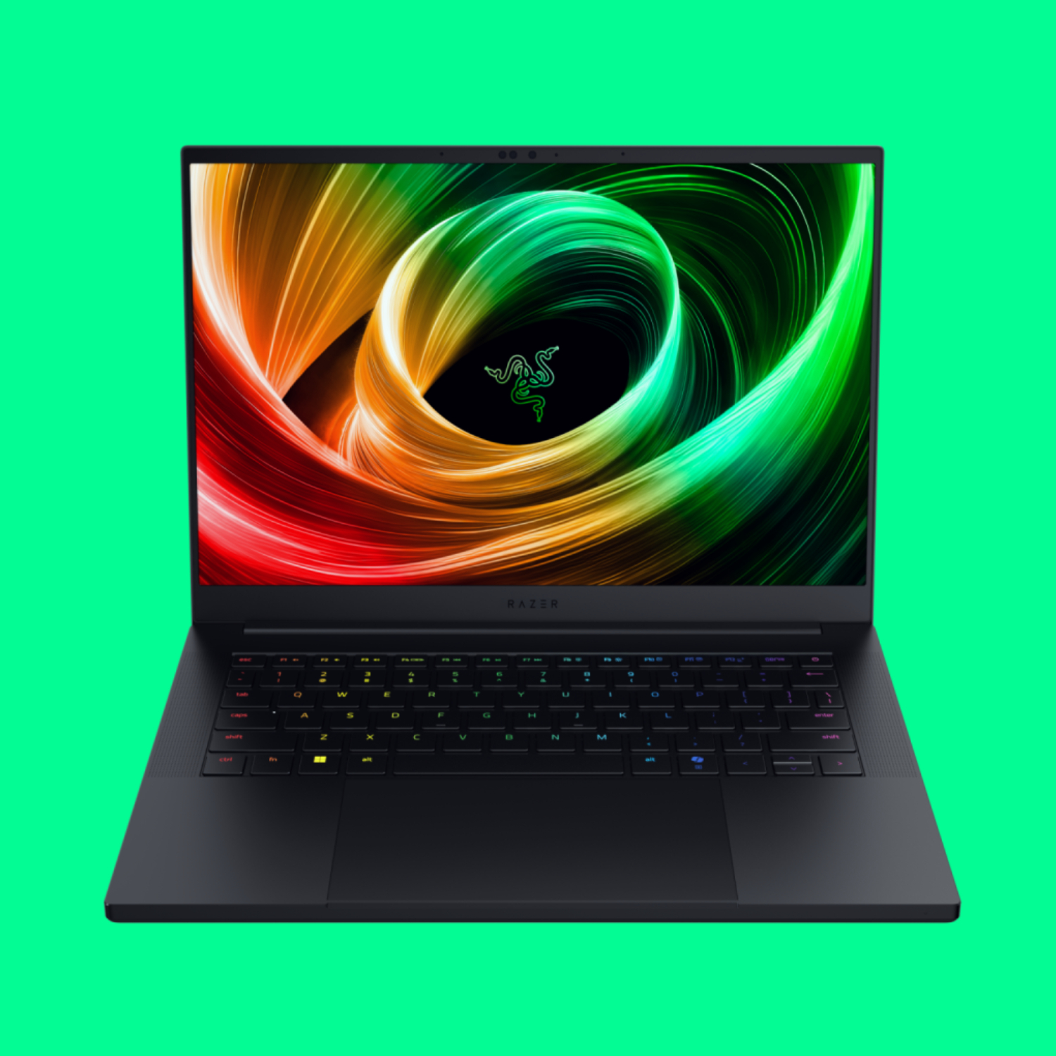 The Razer Blade 14 (2025) 14-inch gaming laptop on a green background