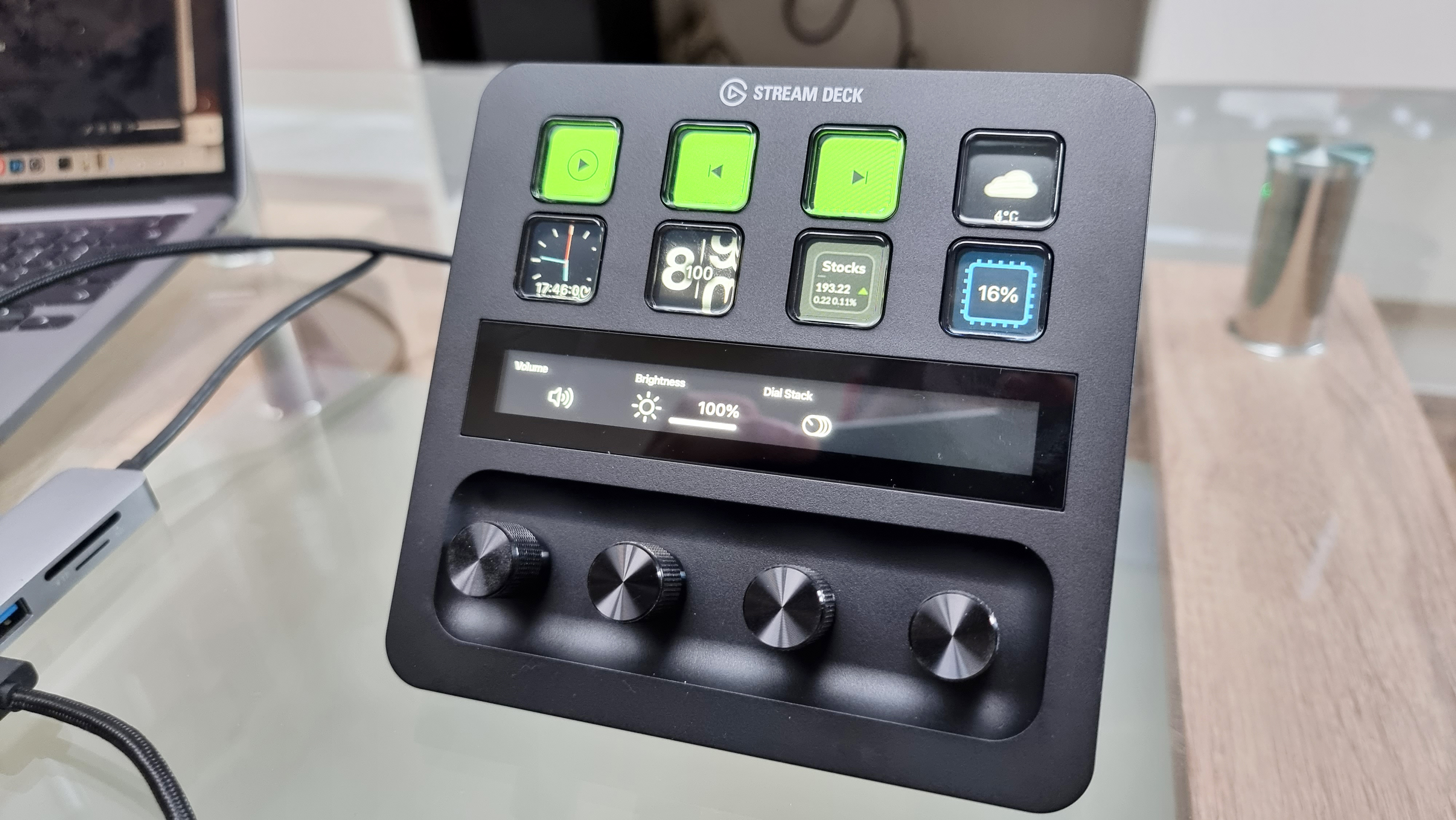 Elgato Stream Deck Plus photographed on a glass table