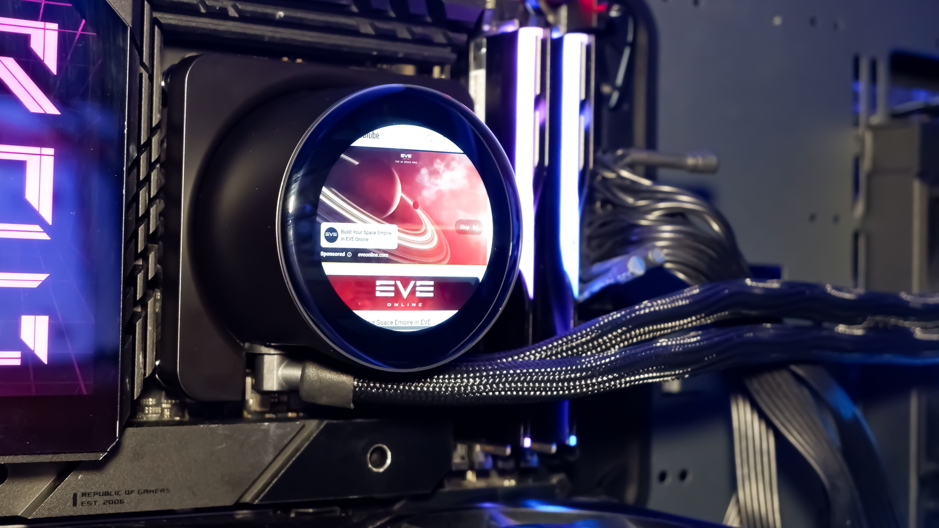 An MSI MPG CoreLiquid P13 all-in-one liquid cooler on a desk and installed onto a test bench for testing.