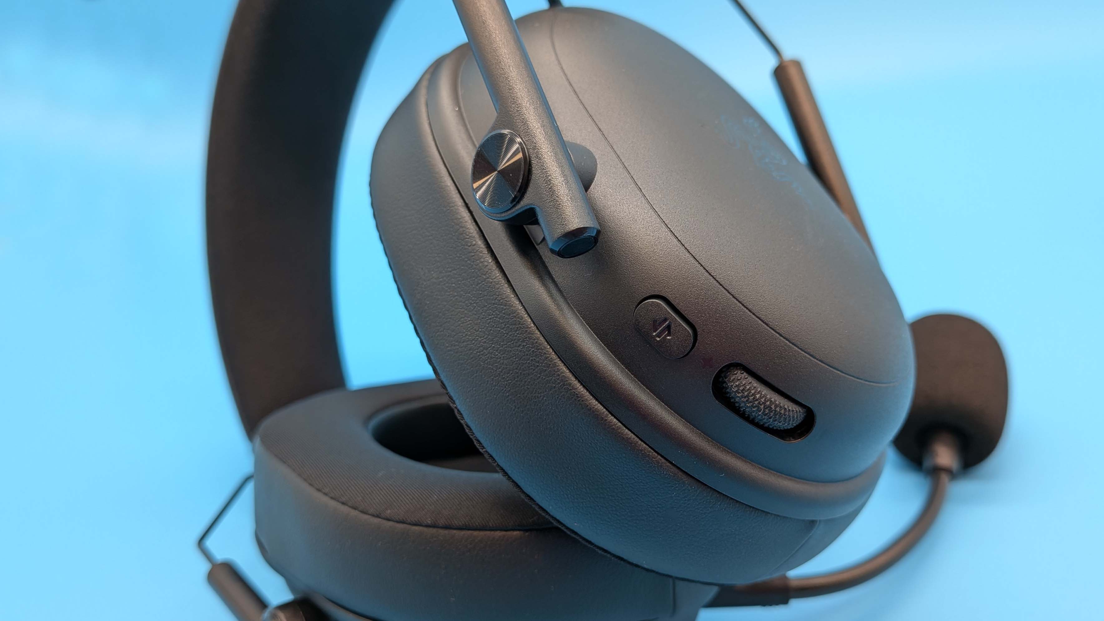 Razer BlackShark V3 gaming headset on a blue blackground