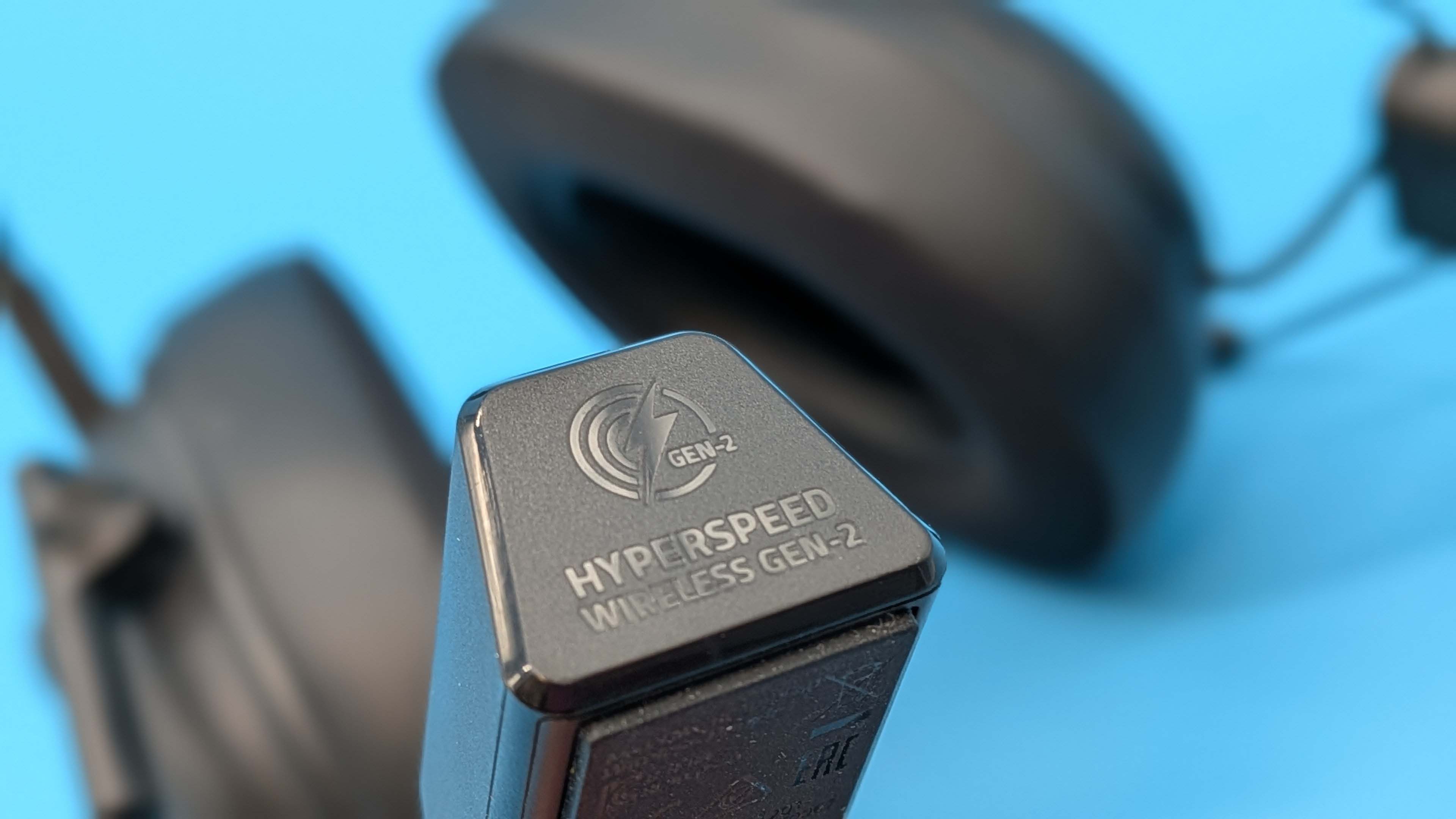 Razer BlackShark V3 gaming headset on a blue blackground