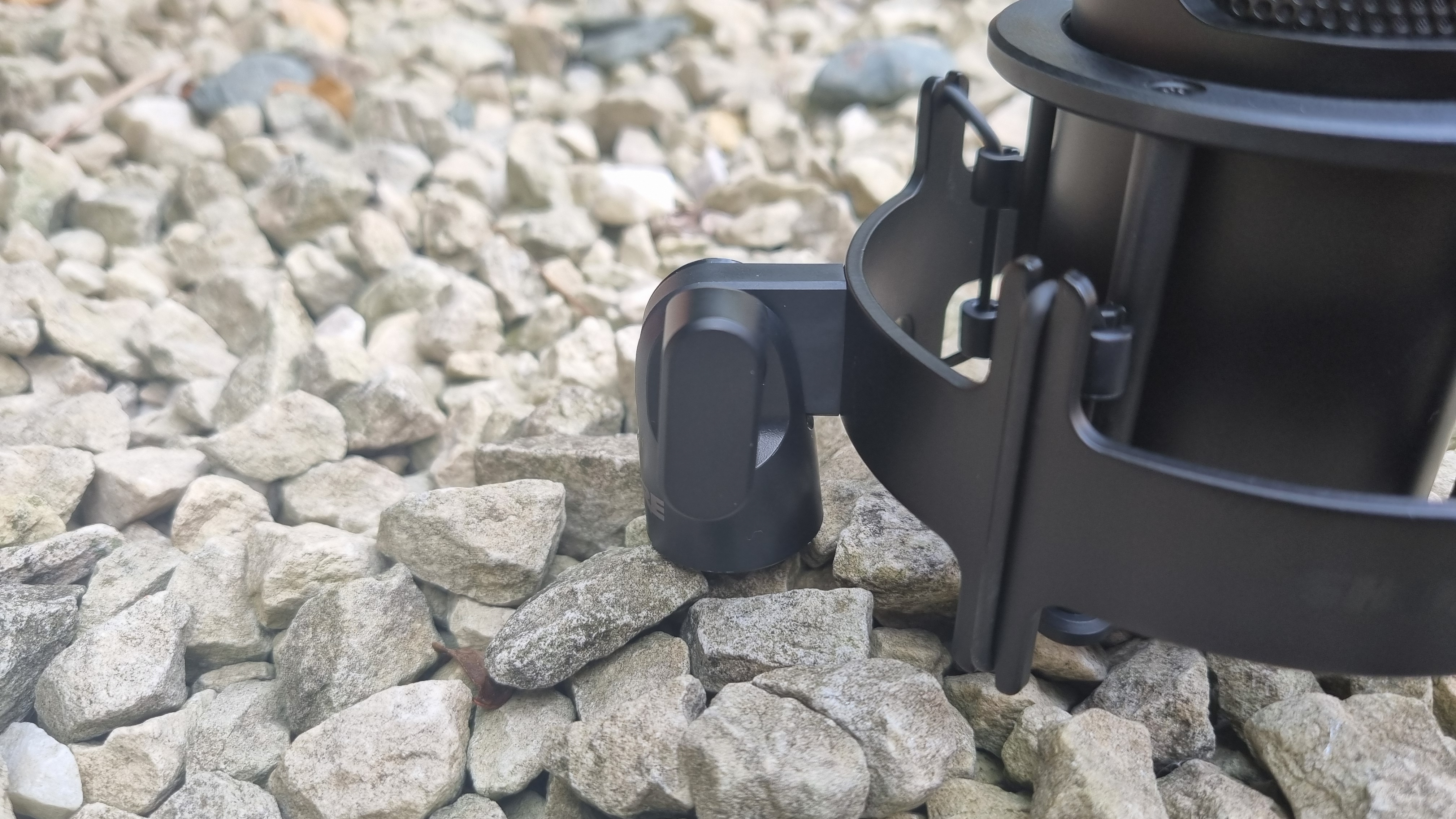 The Shure SM4 Studio Kit, shown on a white gravel background