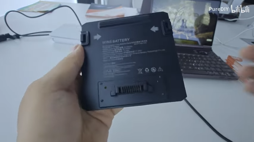 GPD Win 5 gaming handheld on a white table