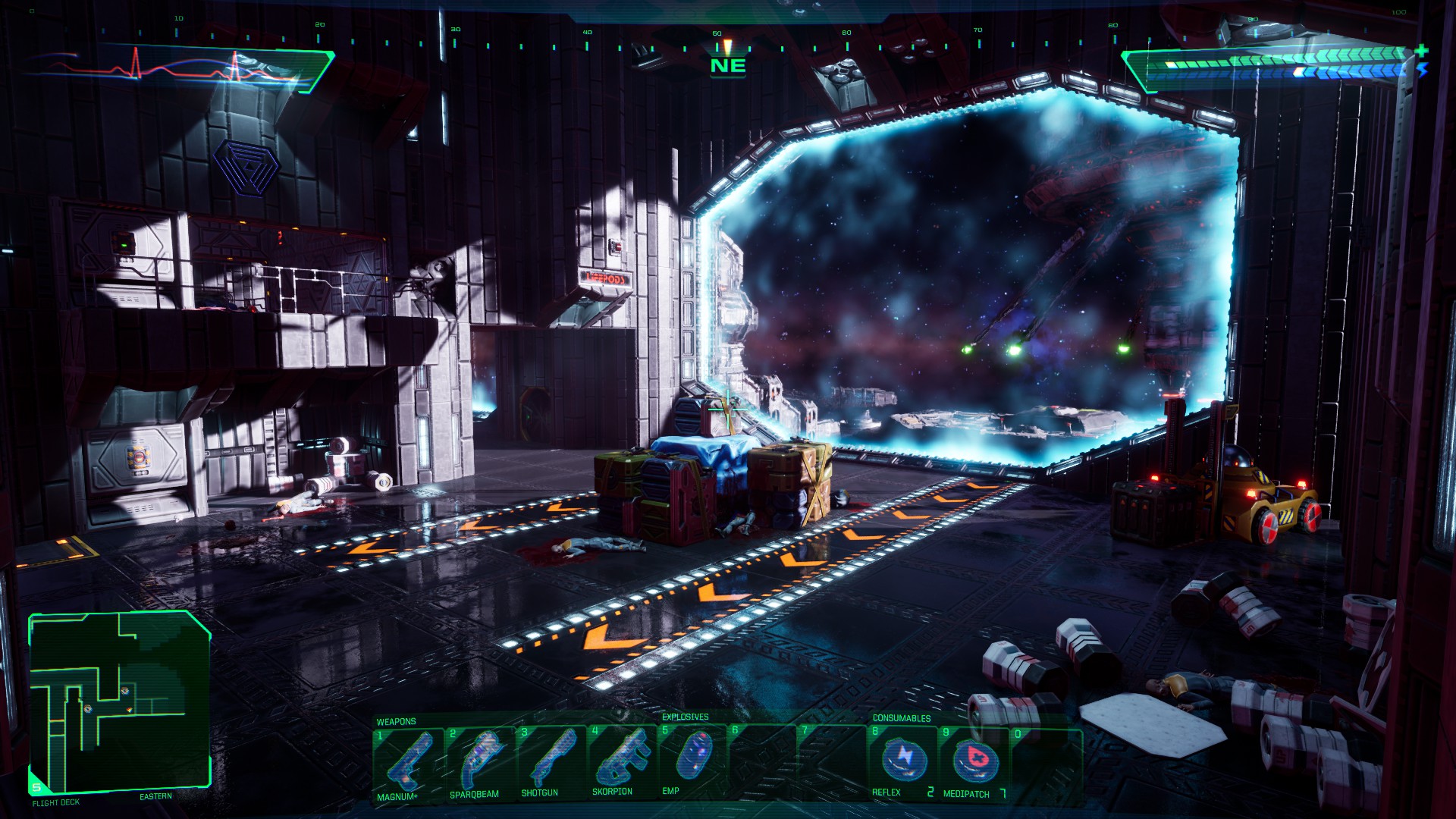 A shot of a wide hangar from the System Shock remake.