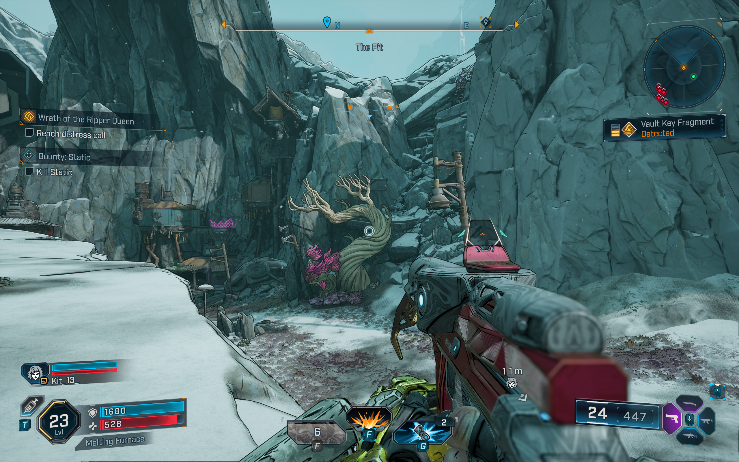 Borderlands 4 vault key fragment locations: A screenshot showing a bent tree with pink leaves next to a cliff, with tall buildings on stilts in the background.