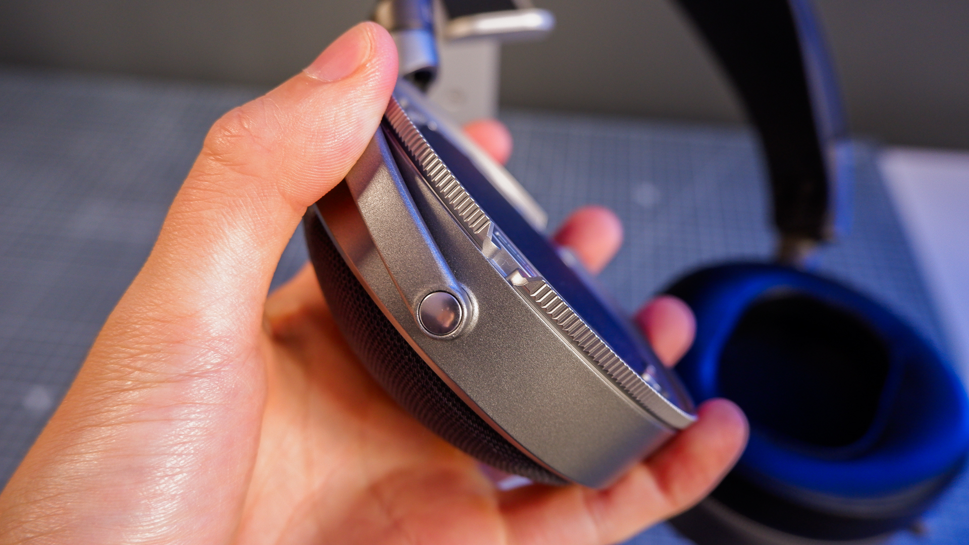 Audeze LCD-S20 gaming headset on a desk with the planar magnetic drivers on show.