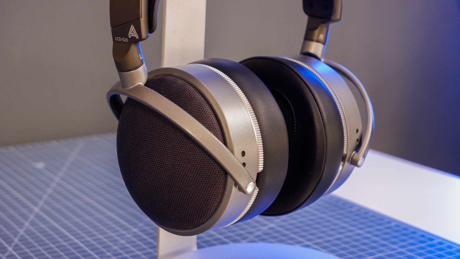 Audeze LCD-S20 gaming headset on a desk with the planar magnetic drivers on show.