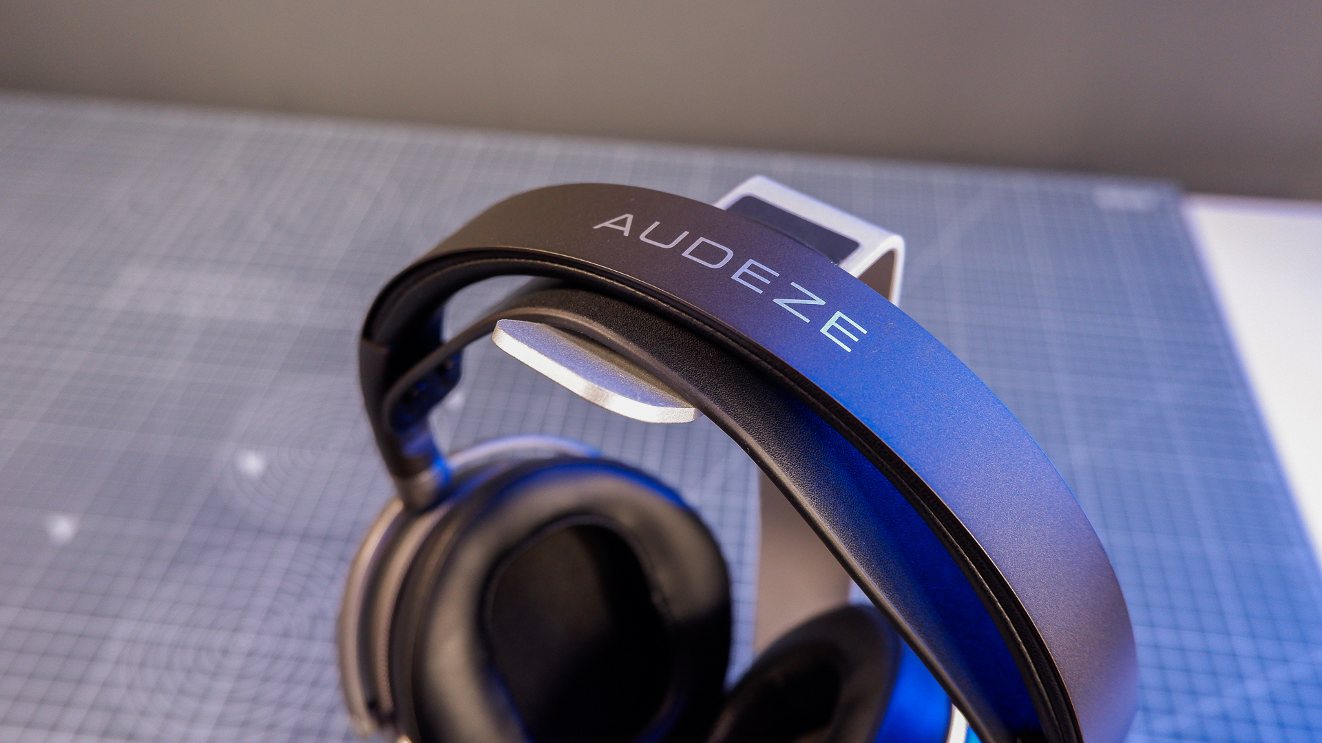 Audeze LCD-S20 gaming headset on a desk with the planar magnetic drivers on show.