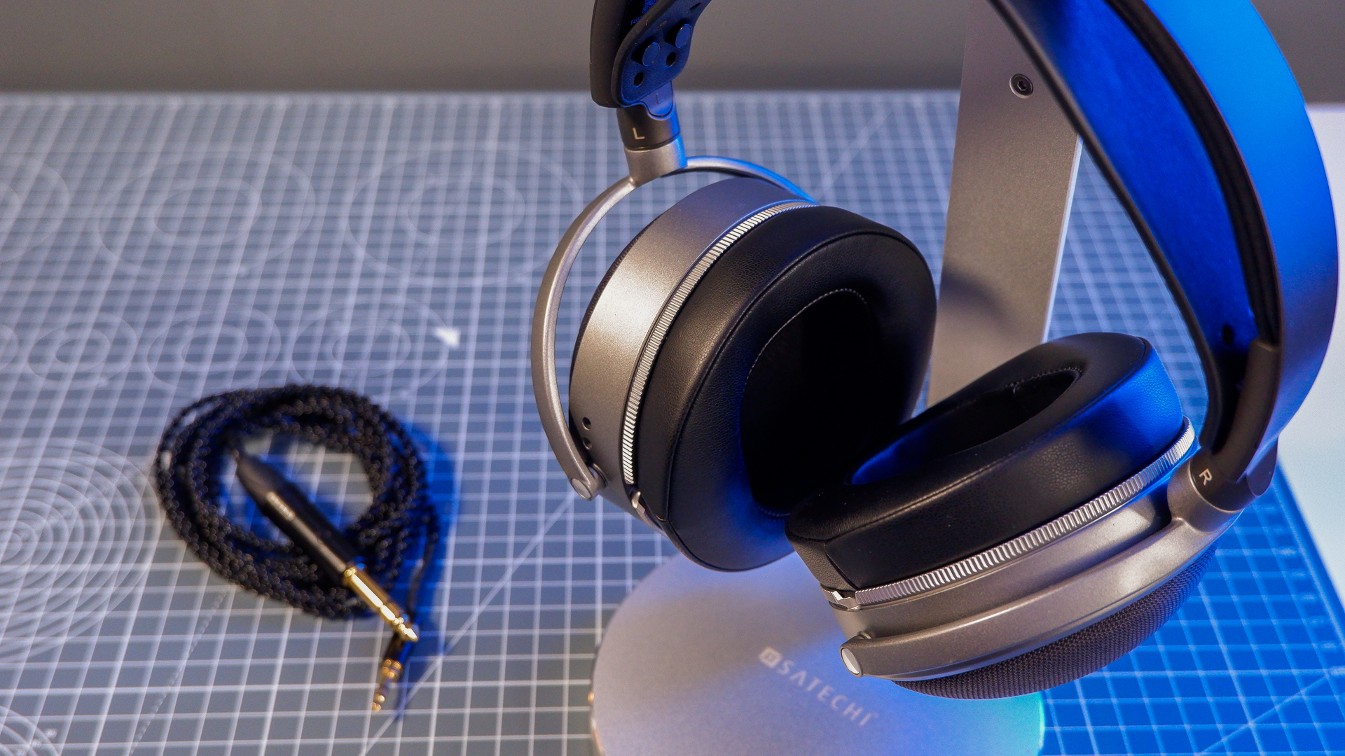 Audeze LCD-S20 gaming headset on a desk with the planar magnetic drivers on show.
