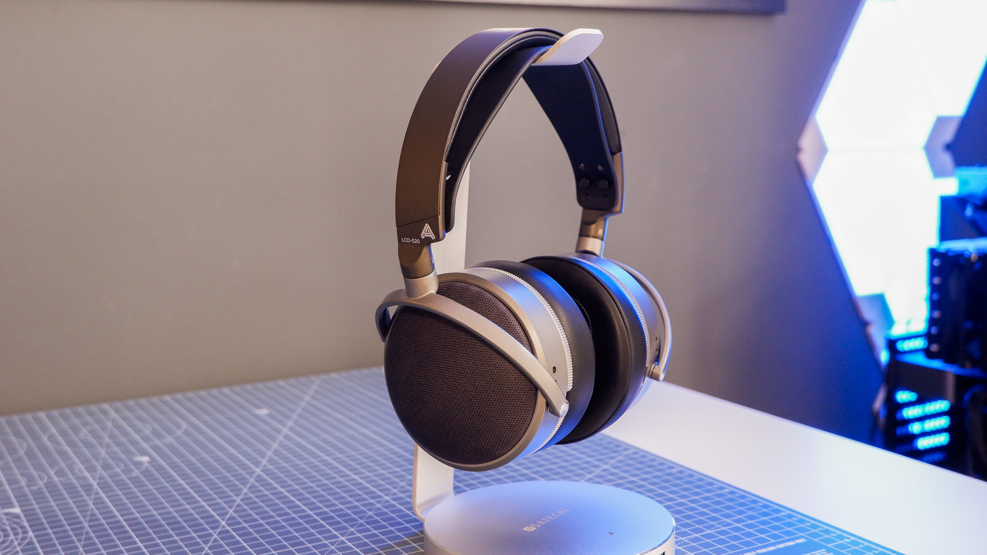 Audeze LCD-S20 gaming headset on a desk with the planar magnetic drivers on show.