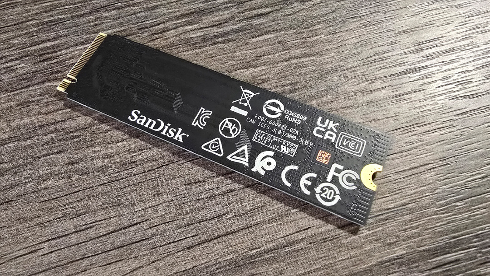 A WD Black SN7100 SSD installed inside a gaming PC.