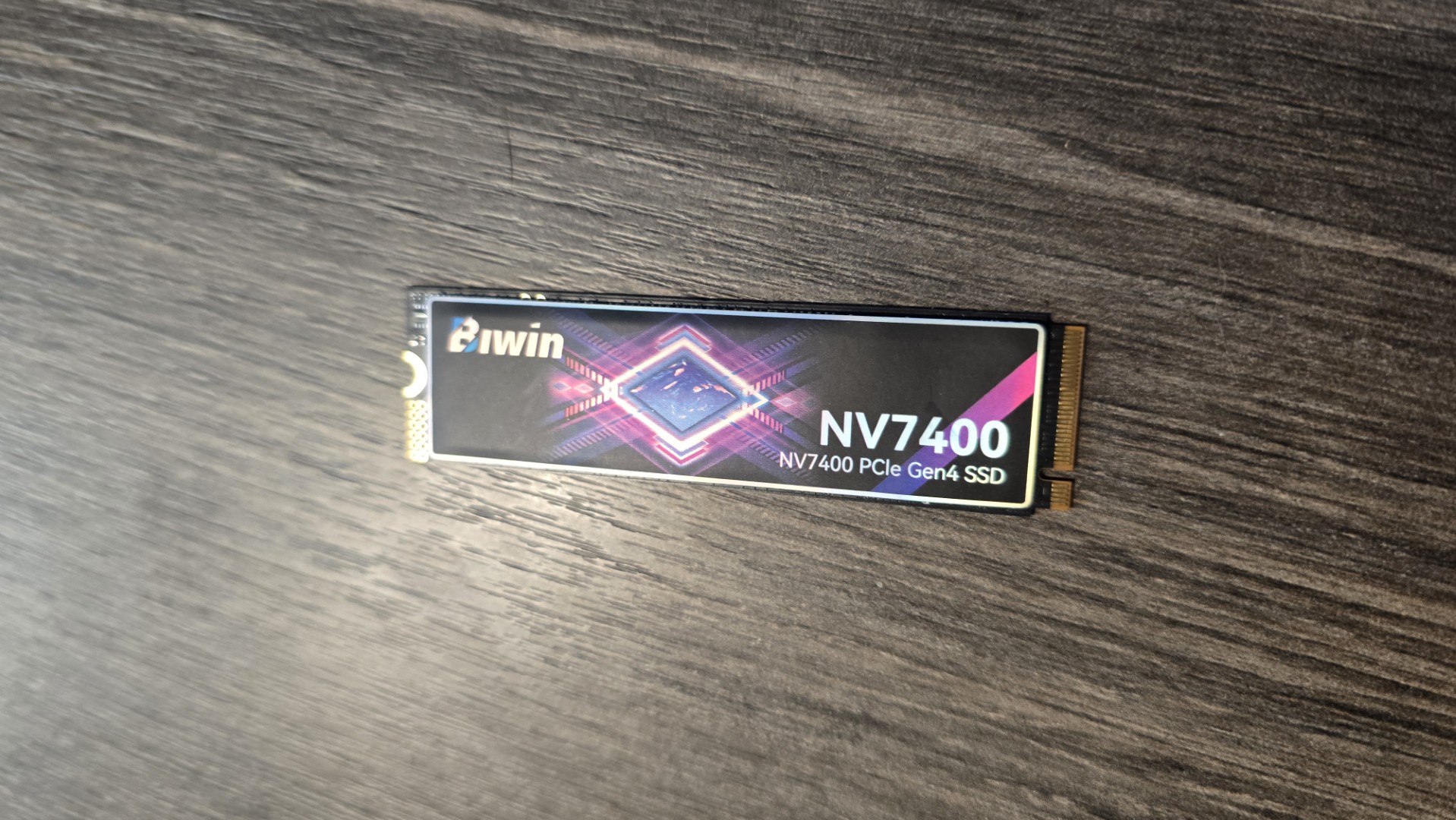 The Biwin Black Opal NV7400 SSD out of its packaging and installed in a PC.