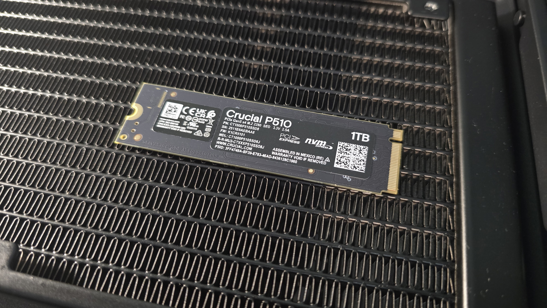 A Crucial P510 SSD installed in a gaming PC.