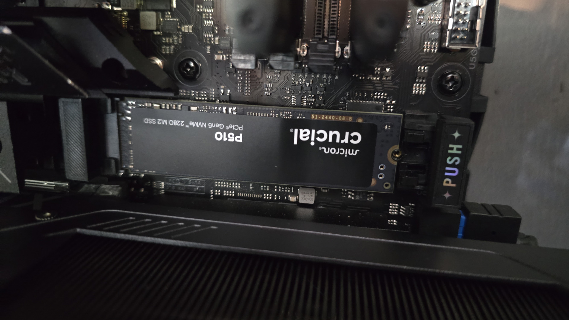 A Crucial P510 SSD installed in a gaming PC.