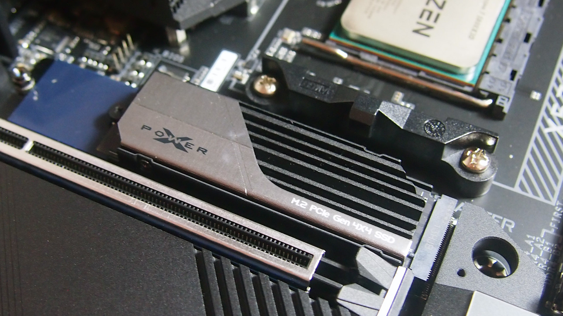 SILICON POWER XS70 2TB NVME SSD on a motherboard.