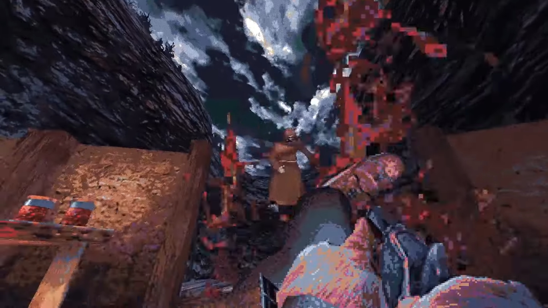 Kicking a hooded cultist as blood flies out of them