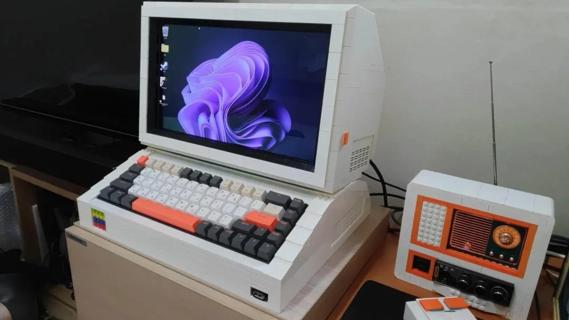 Retro-style PC housing built using white Lego-style bricks.