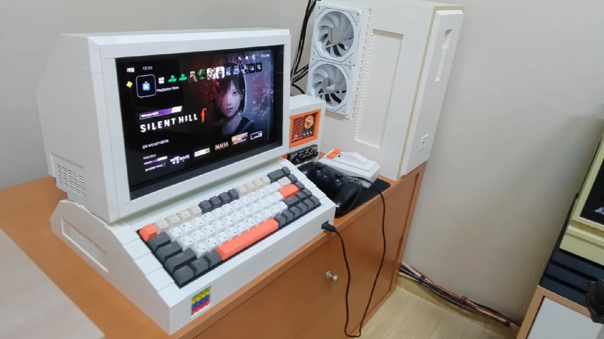 Retro-style PC housing built using white Lego-style bricks.