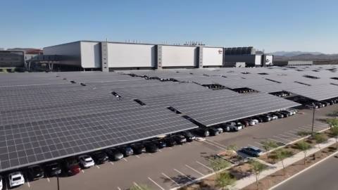 A screenshot from a promotional video showing the outside of TSMC's Arizona chip fabrication facility