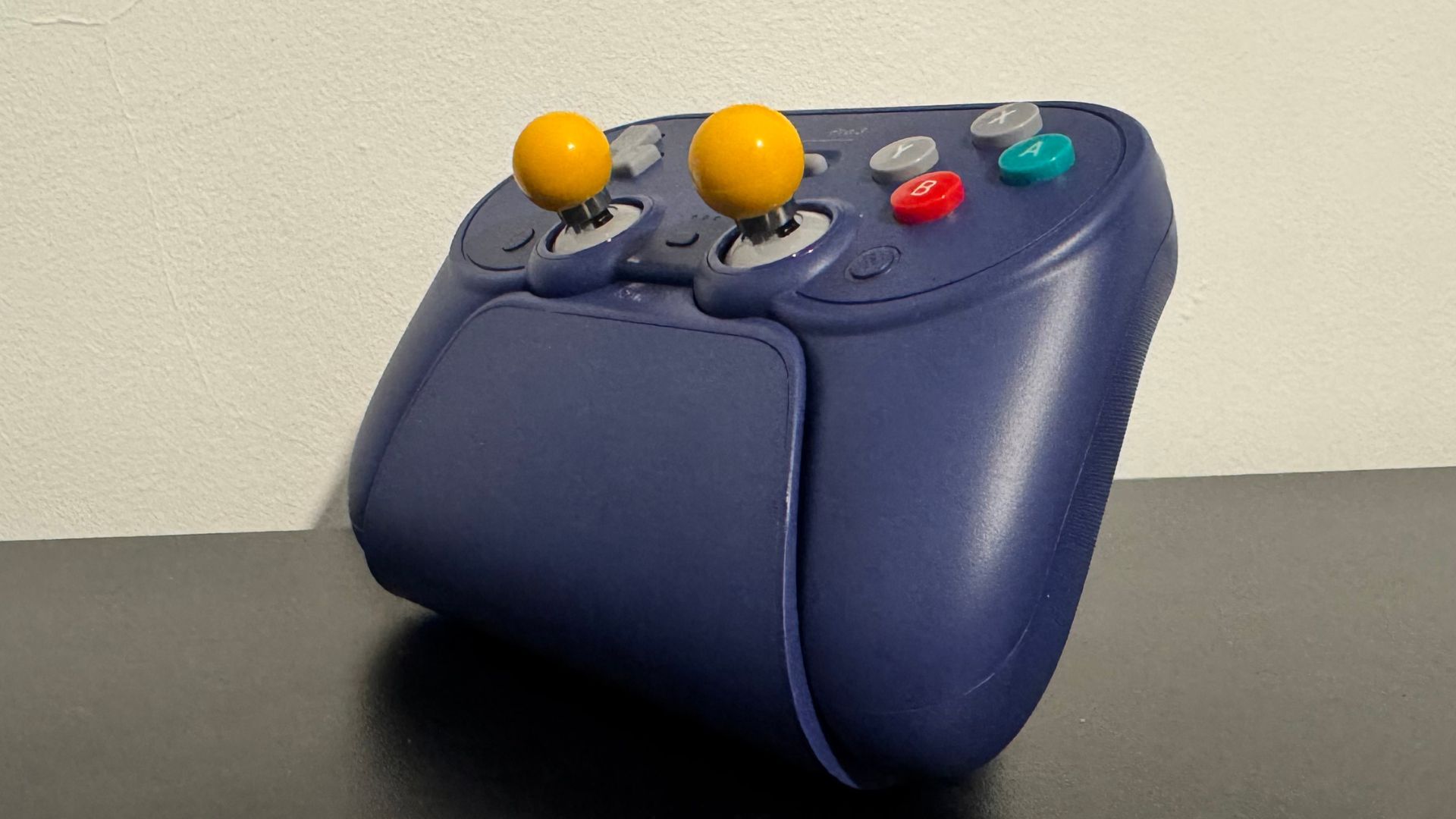 8BitDo Pro 3 controller with yellow ball thumbsticks