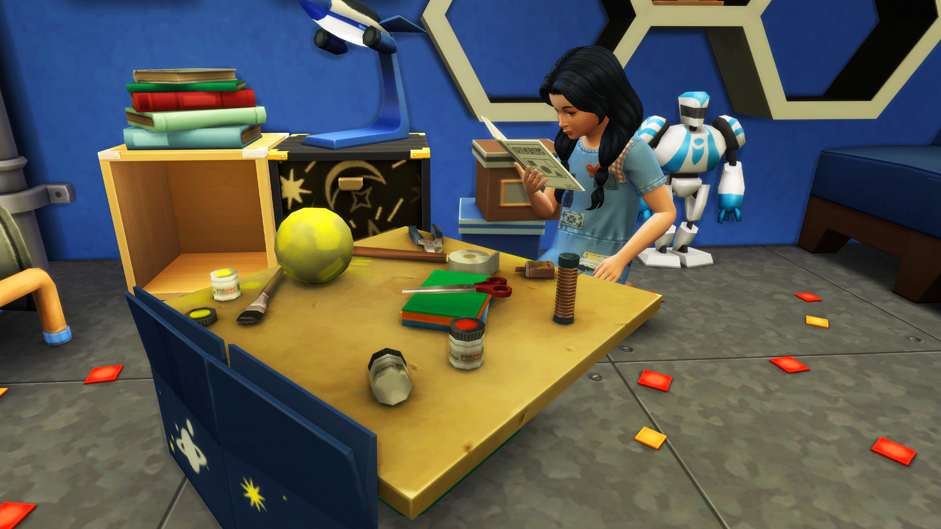 A kid Sim working on a solar system school projects in The Sims 4