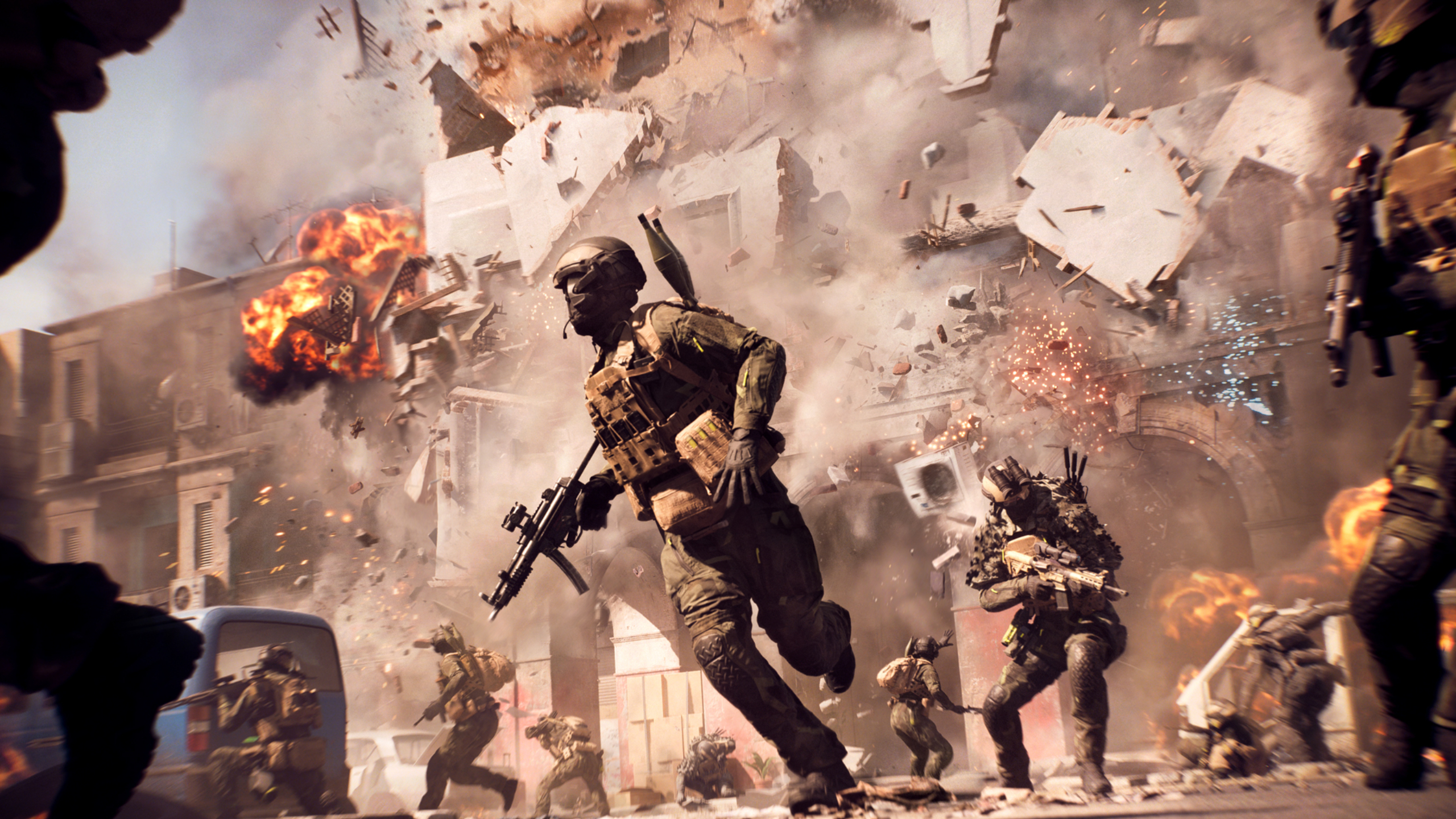 Battlefield 6 Destruction Receipts event: Soldiers running away from a collapsing building.