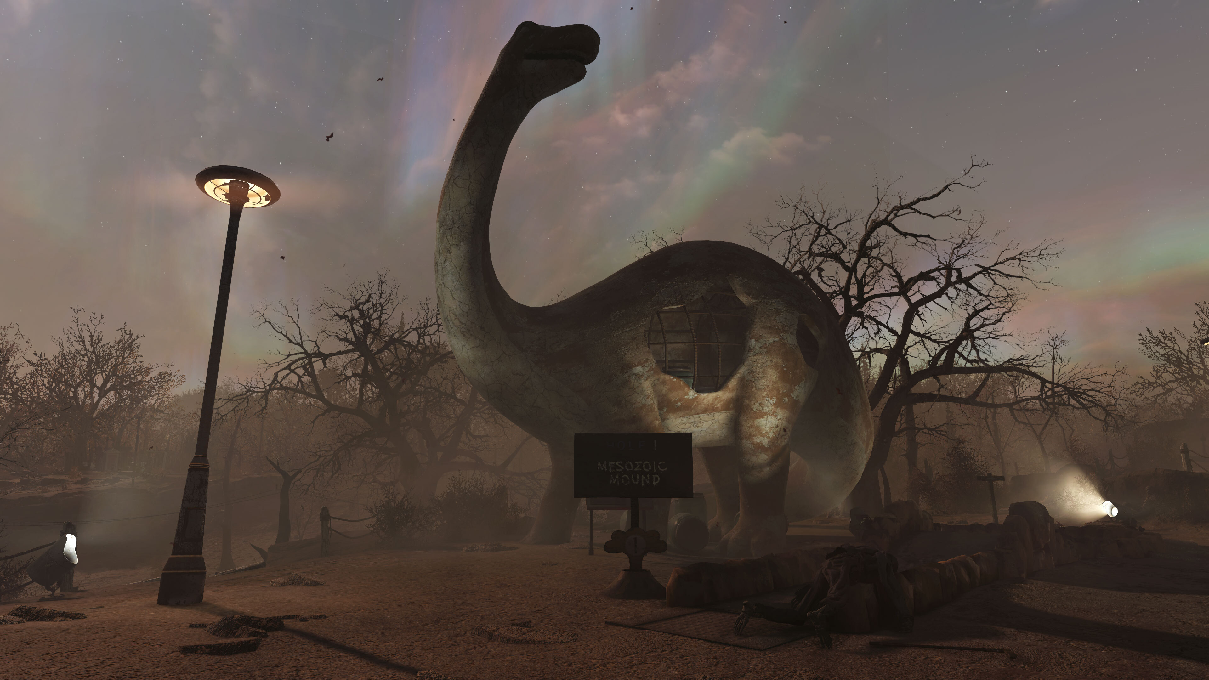 A decaying dinosaur statue