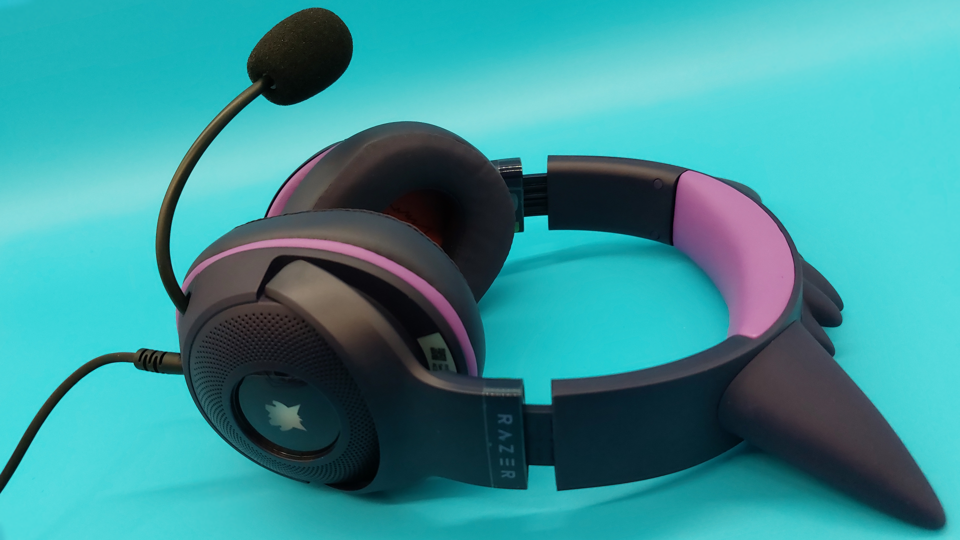 The Razer Kraken Kitty V2 - Gengar edition wired gaming headset is seen from various angles.