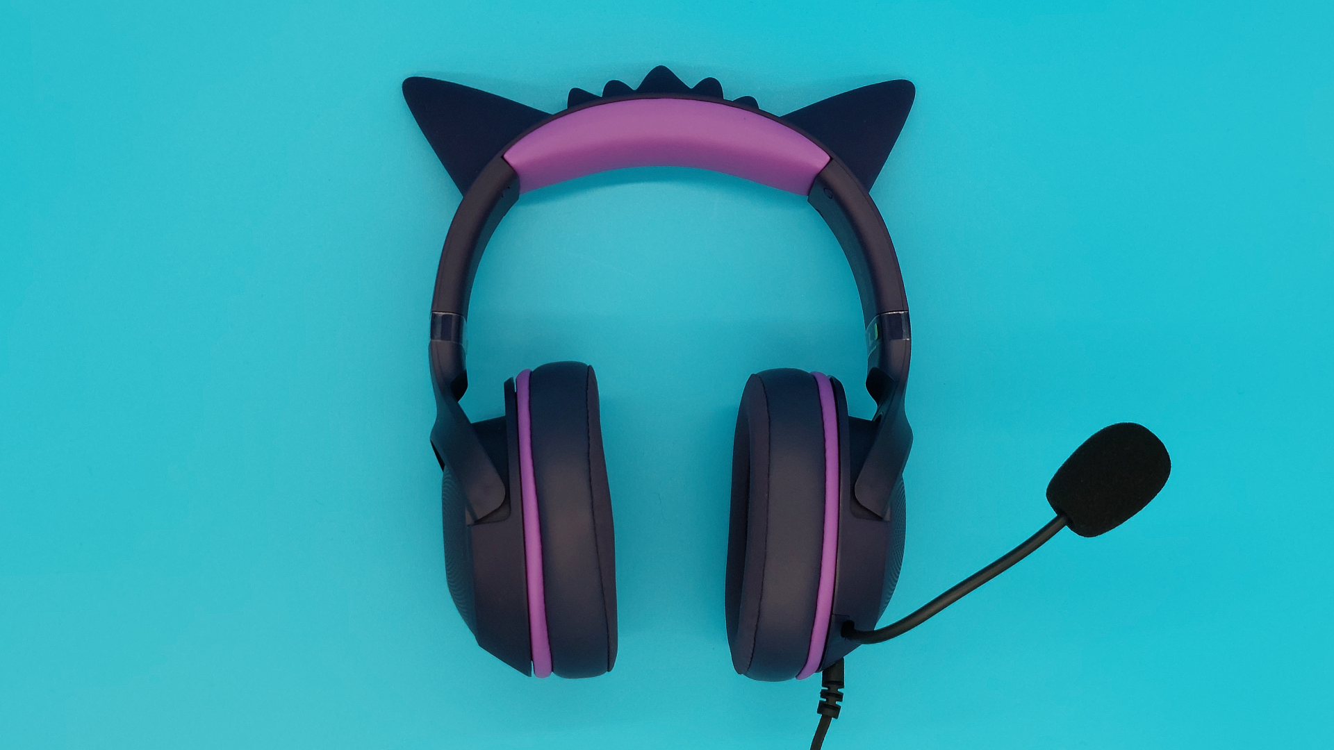The Razer Kraken Kitty V2 - Gengar edition wired gaming headset is seen from various angles.