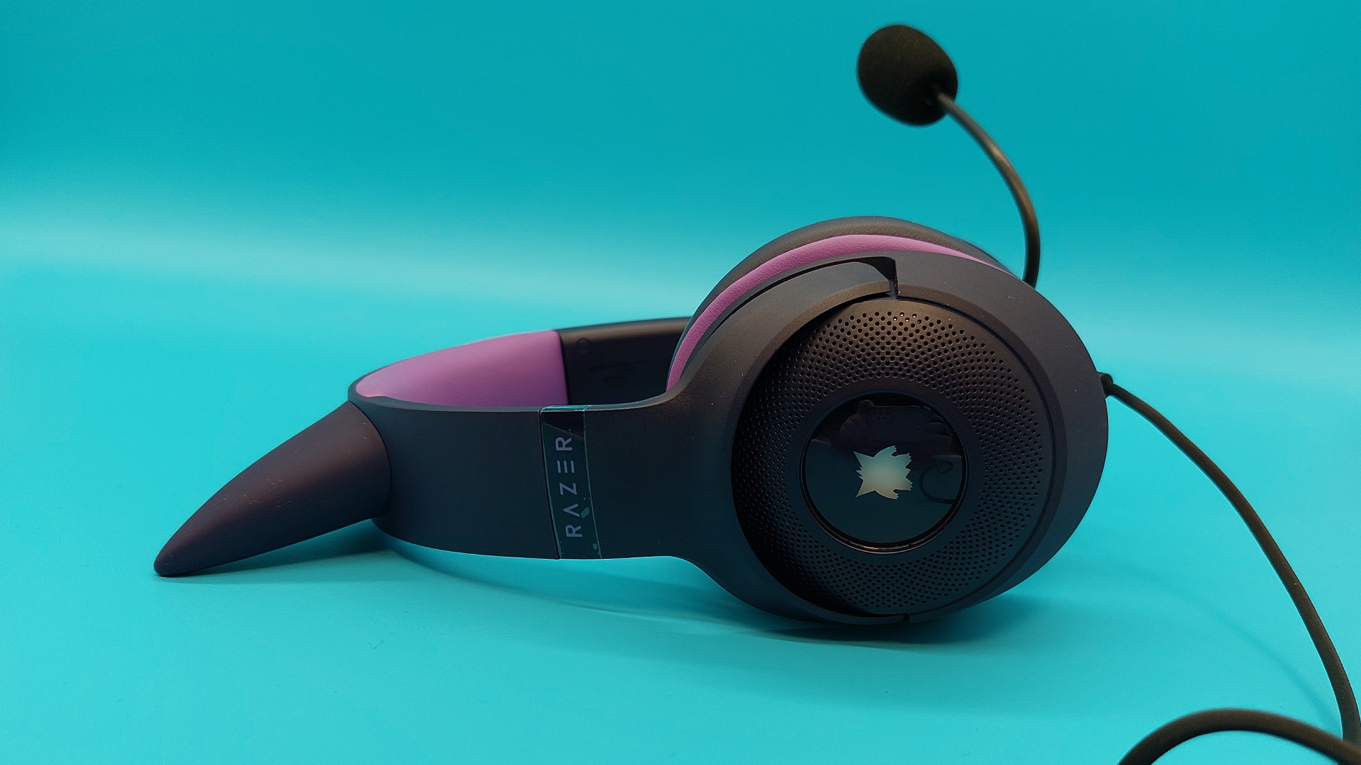 The Razer Kraken Kitty V2 - Gengar edition wired gaming headset is seen from various angles.