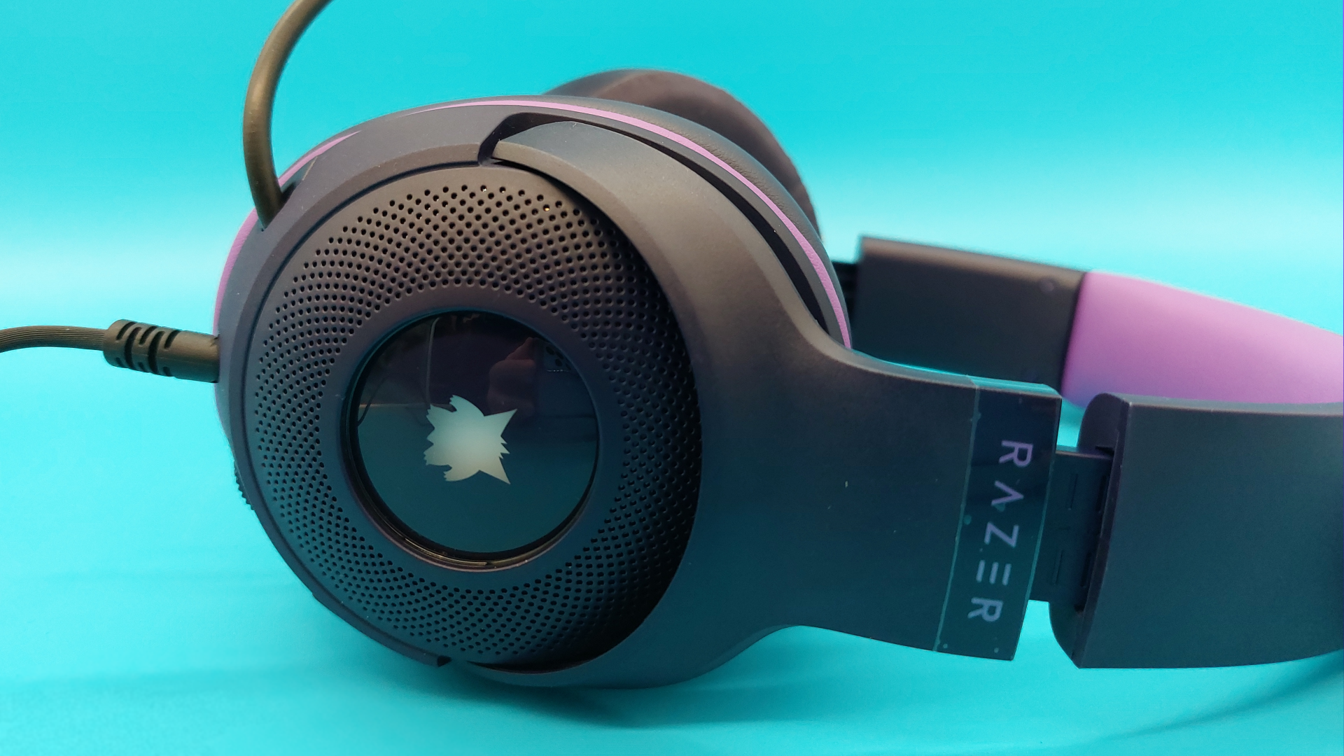 The Razer Kraken Kitty V2 - Gengar edition wired gaming headset is seen from various angles.