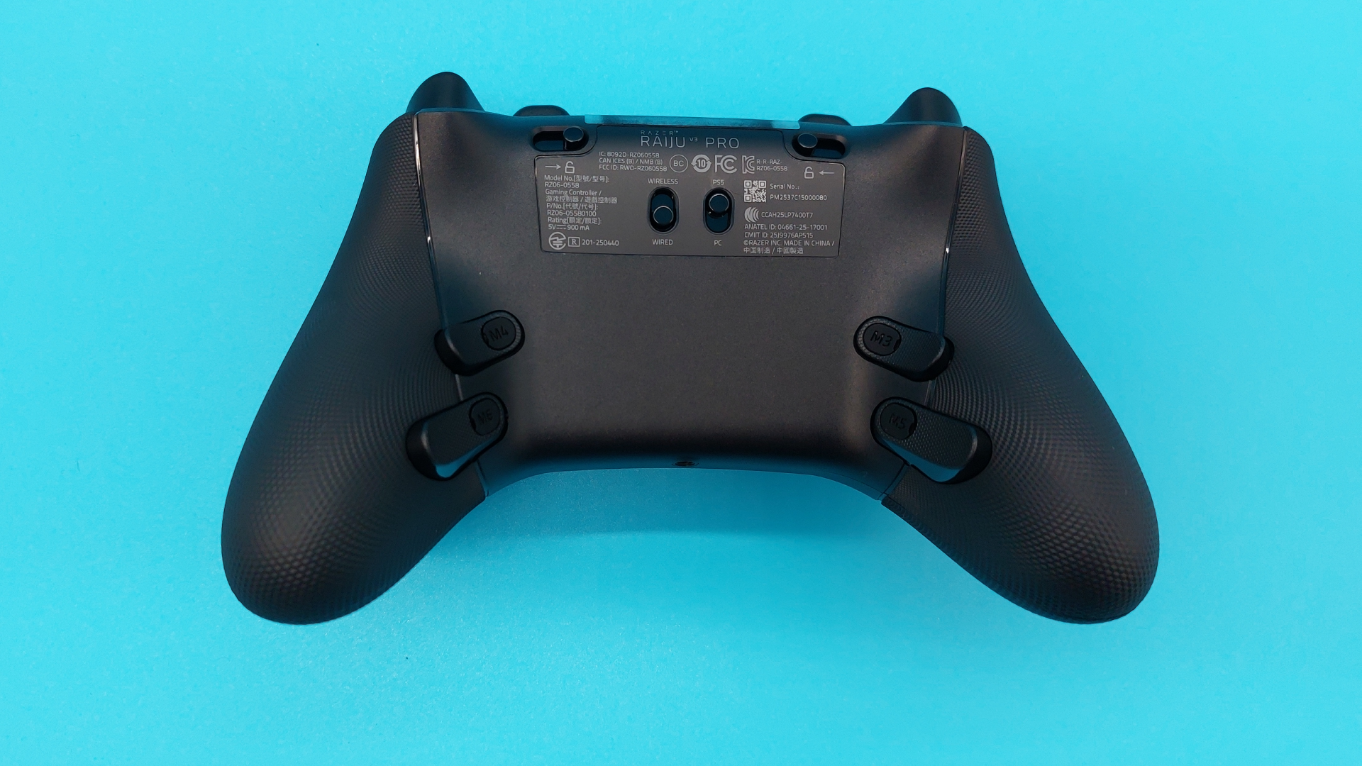 The Razer Raiju V3 Pro wireless controller seen from various angles.