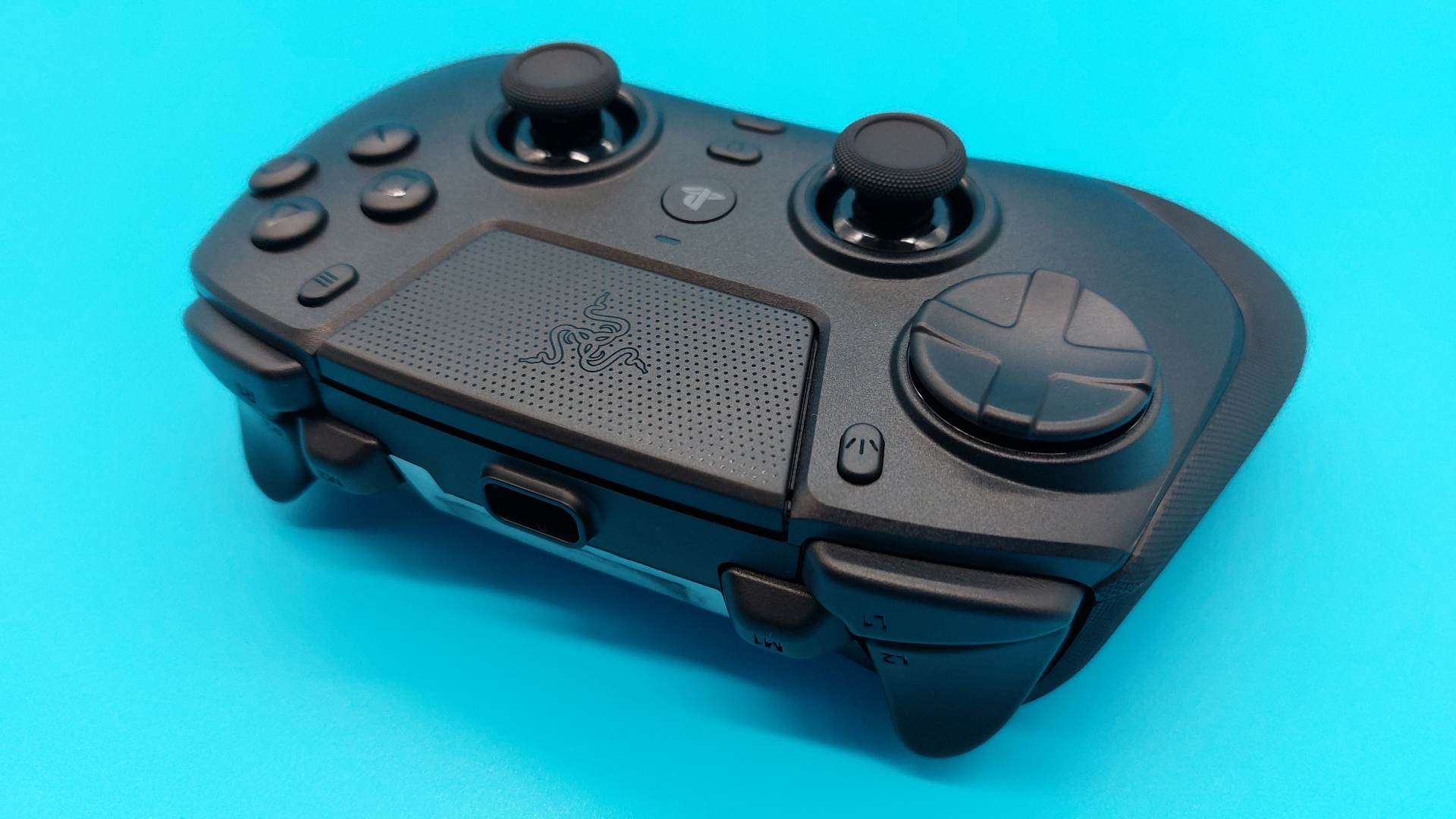 The Razer Raiju V3 Pro wireless controller seen from various angles.