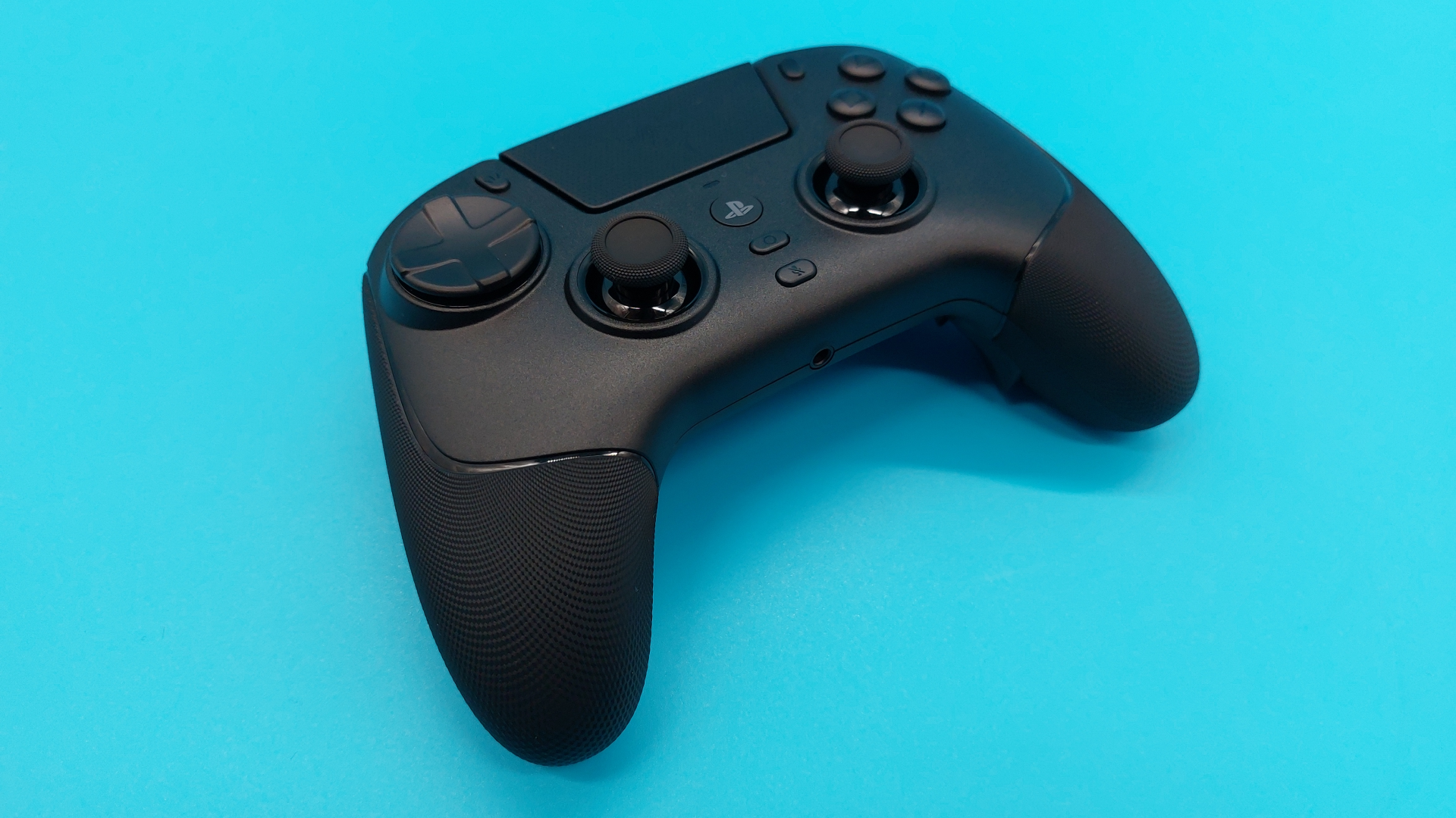 The Razer Raiju V3 Pro wireless controller seen from various angles.