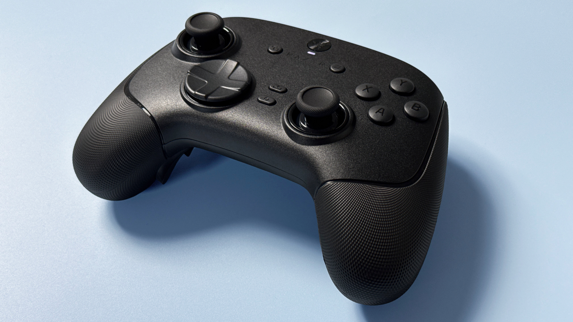 Razer Wolverine V3 Pro 8K Pro controller on a light blue background