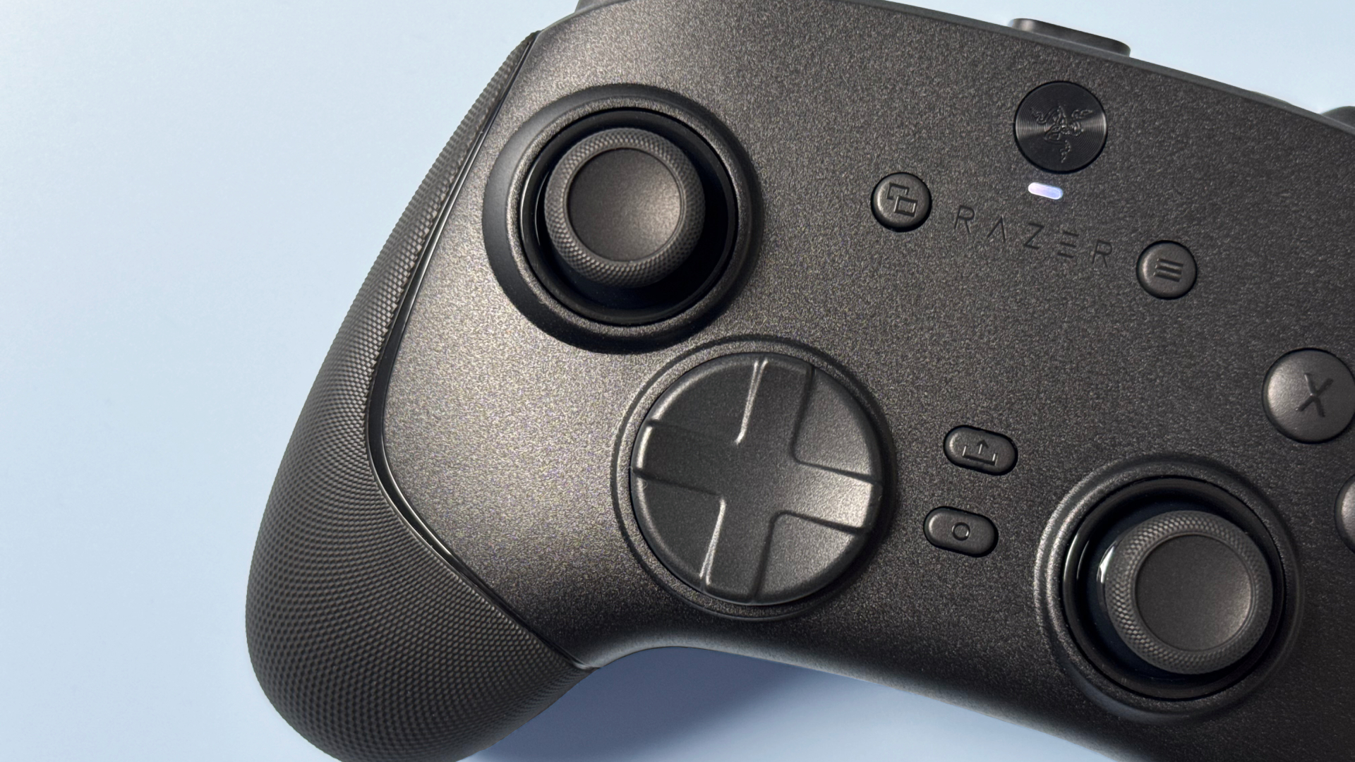 Razer Wolverine V3 Pro 8K Pro controller on a light blue background