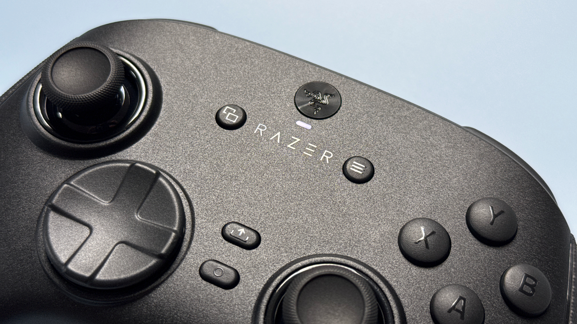 Razer Wolverine V3 Pro 8K Pro controller on a light blue background