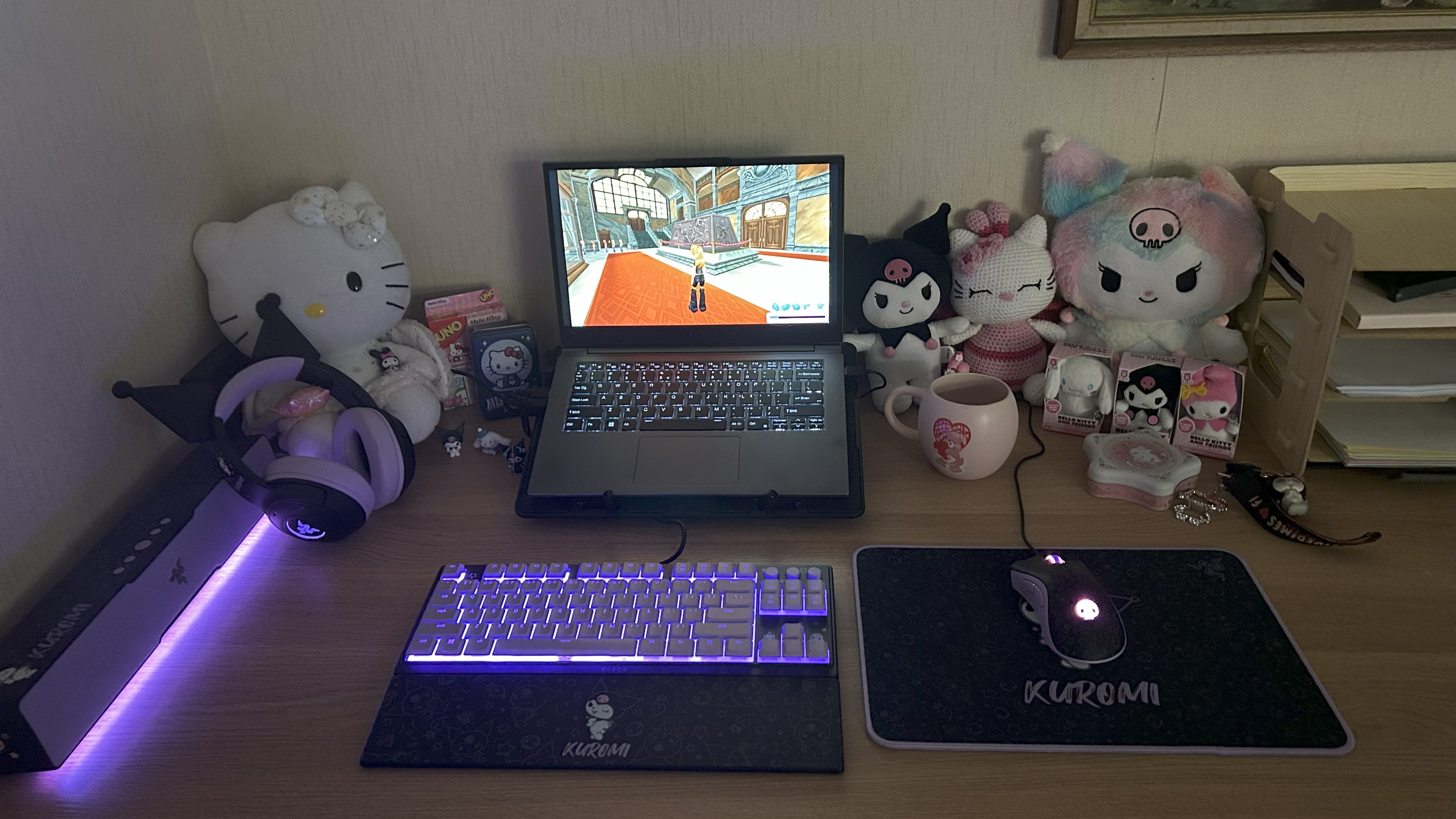 Razer | Kuromi collection peripherals laid out on a desk.