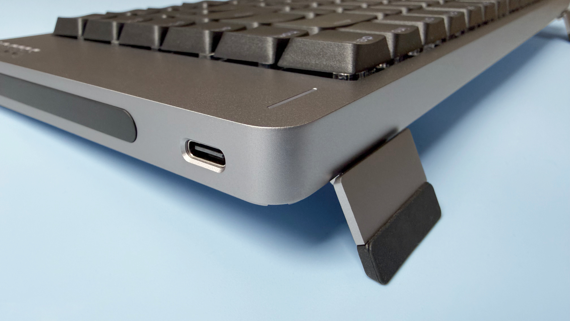 Lofree Flow 2 keyboard on a light blue background