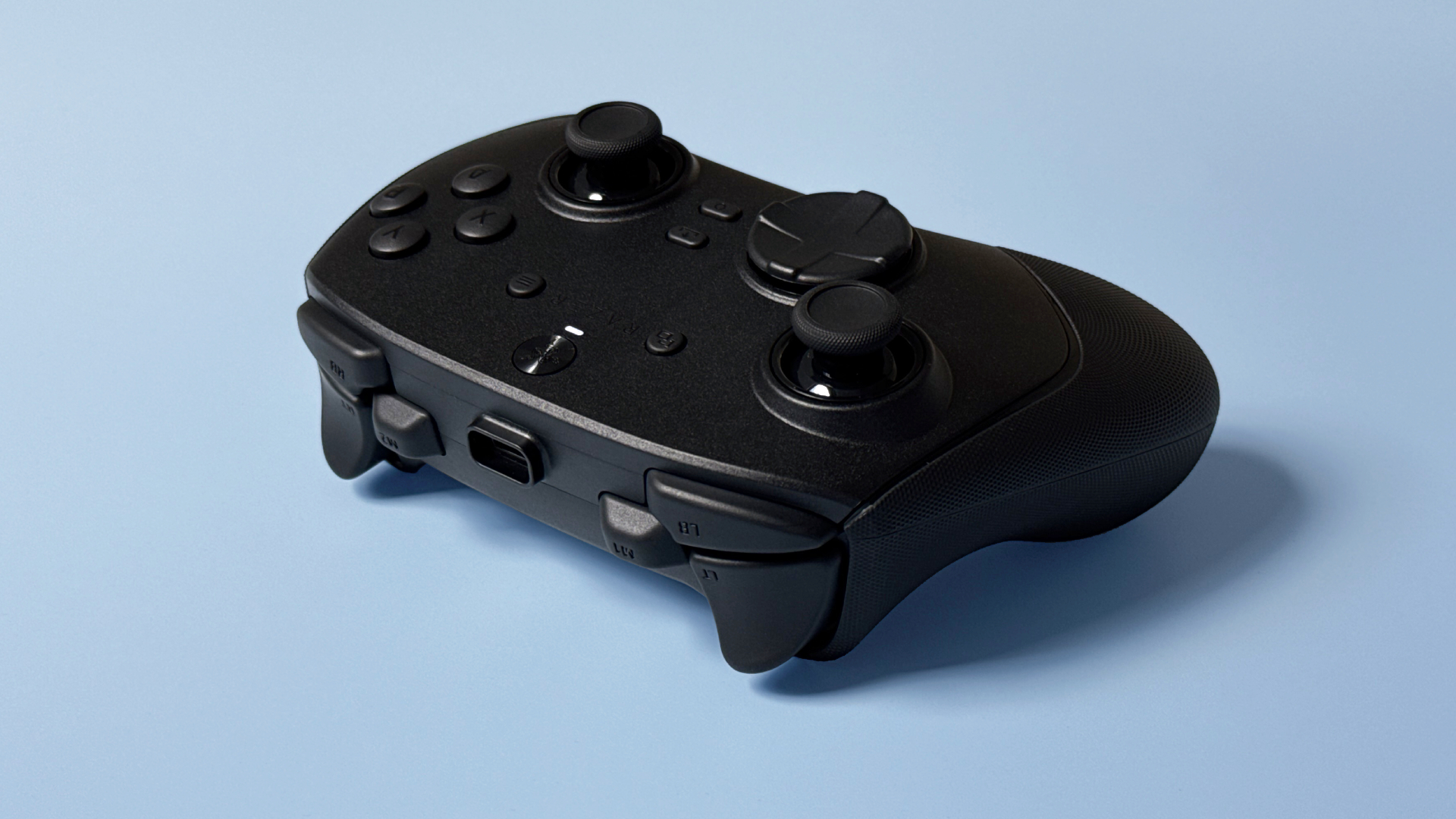 Razer Wolverine V3 Pro 8K Pro controller on a light blue background