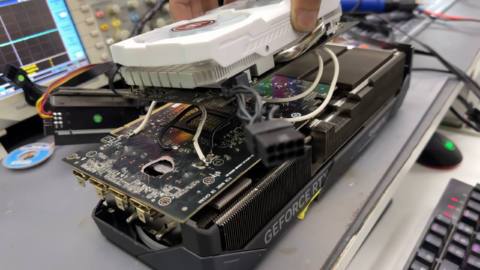 This RTX 5070 Ti with a literal hole in it has been kept on life support by a spliced-in AMD RX 580, because no GPU gets left behind
