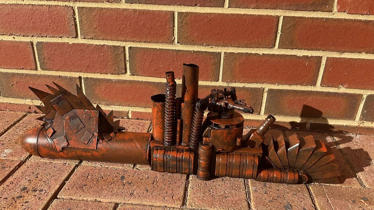 An ork submarine made out of junk that's been painted