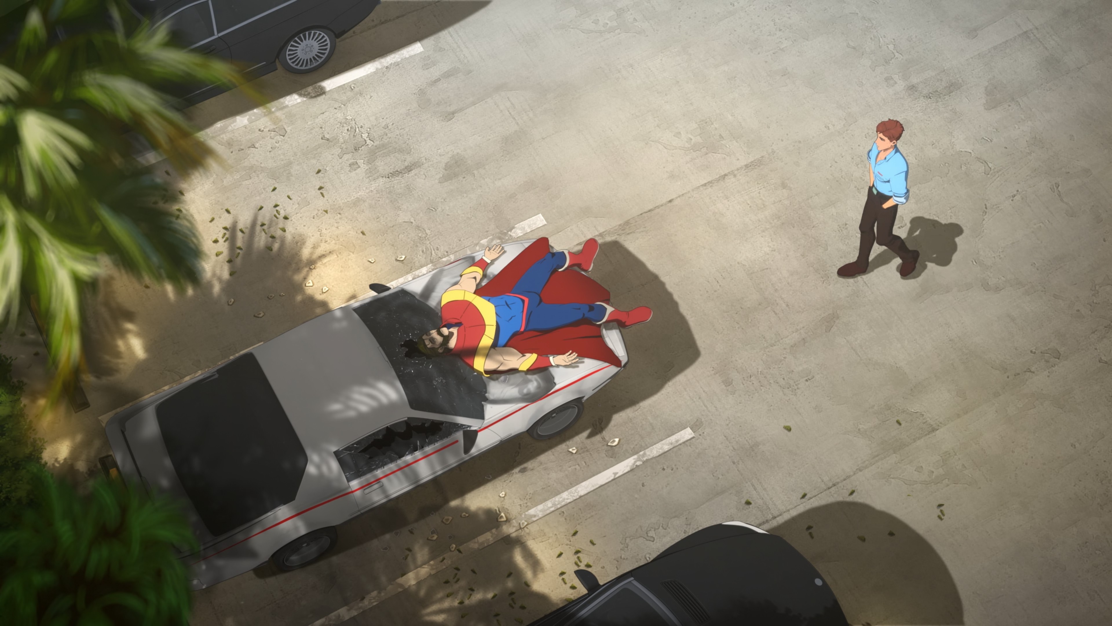 Phenomaman lying on a car