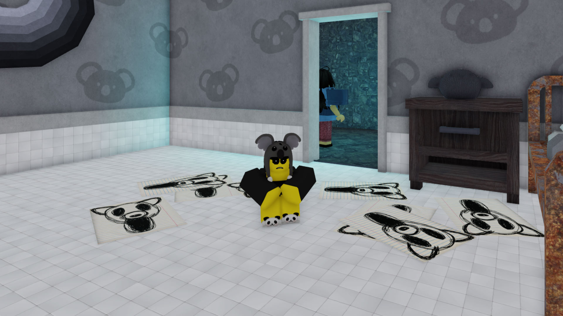 99 Nights in the Forest Koala Kid sitting on the floor in a black and white room with drawings of The Deer scattered about