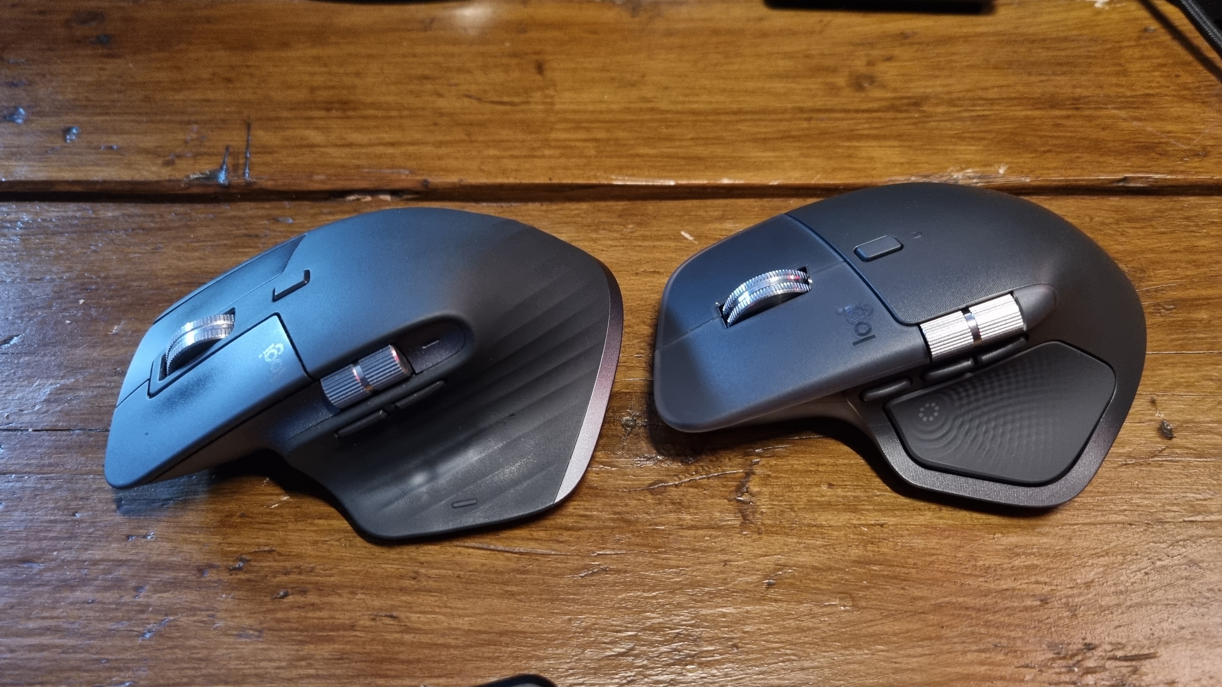 The Logitech MX Master 3S in front, the Logitech MX Master 4 in the rear