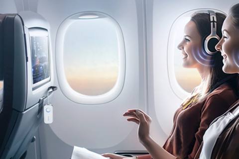 This Tiny Gadget Lets You Connect Your Bluetooth Headphones to the Plane’s Screen, and It Costs Pennies