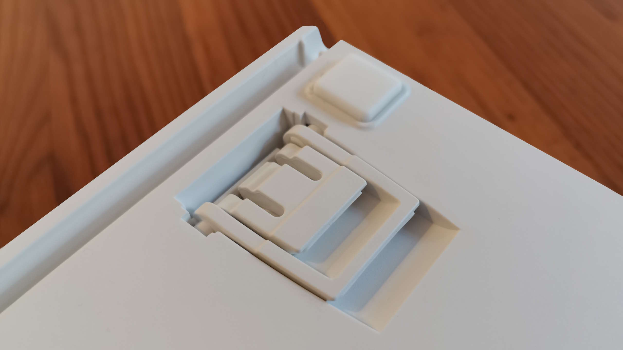 MSI Forge GK600 TKL gaming keyboard on a desk.